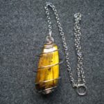 pendentif pendule spirale œil de tigre