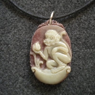 pendentif Singe pour la séduction