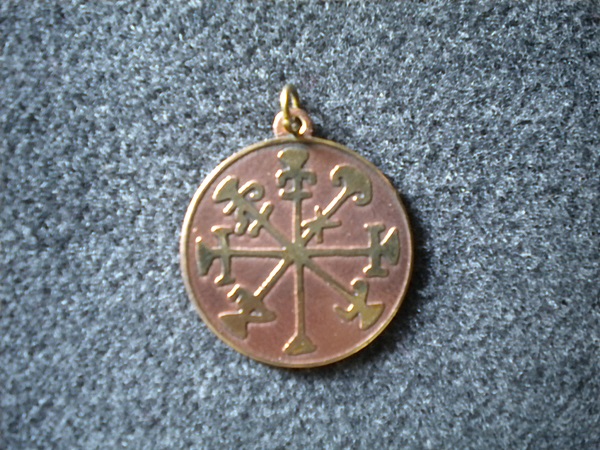 pendentif amulette pour les profits